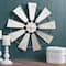 Glitzhome® 22" Beige Metal Wind Spinner Wall Décor